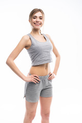 Fototapeta premium Young sporty Caucasian female model isolated on white background