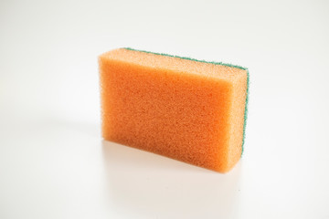 Isolated orange sponge on the white background