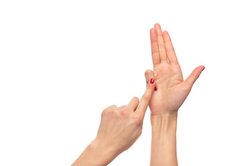 Female hands bend the fingers on white background.
