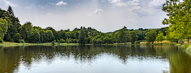 Fototapeta premium Summer at the lake - Sauviat sur Vige, France