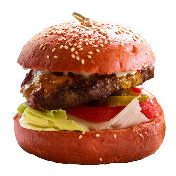 meat burger with onion tomato lettuce and salted cucumber close-up isolate