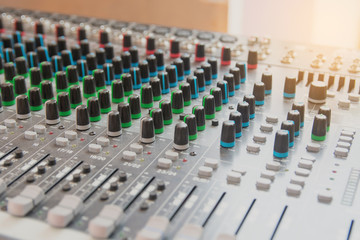 Audio sound mixer control panel.  Sound console buttons for adjust the volume