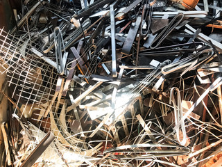 The steel waste,metal pile,stainless steel rubbish,stacked together,prepare for recycle and reused
