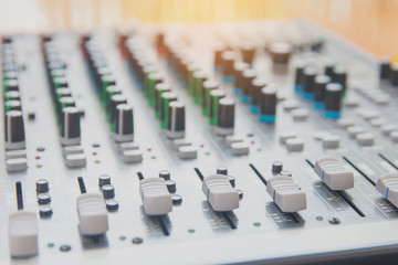 Audio sound mixer control panel.  Sound console buttons for adjust the volume
