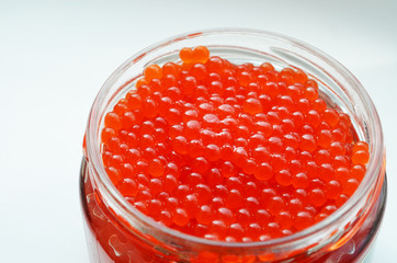 Close-up red caviar in a jar ,photo