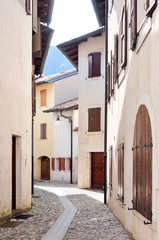 Fototapeta na wymiar Venzone, Italy. Streets of Venzone, old town, located in the historic Friuli region.