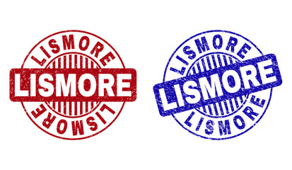 Grunge LISMORE round stamp seals isolated on a white background. Round seals with grunge texture in red and blue colors. Vector rubber watermark of LISMORE text inside circle form with stripes.