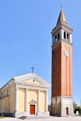 Obraz premium Santa Maria la Longa, Italy. View of the old catholic church (Chiesa di Santa Maria Assunta)