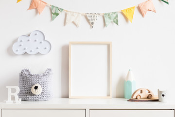 Stylish scandinavian newborn baby room with toys, teddy bear, accessories, ,cloud,colorful cotton...