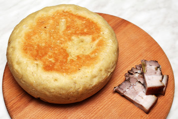 Homemade bread on the table with bacon