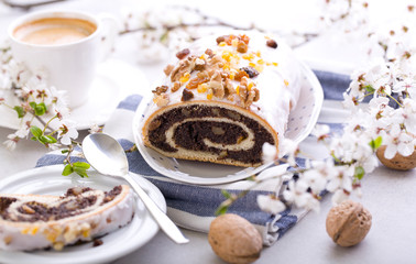 Delicious poppy-seed cake in a spring composition.