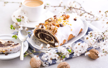Delicious poppy-seed cake in a spring composition.