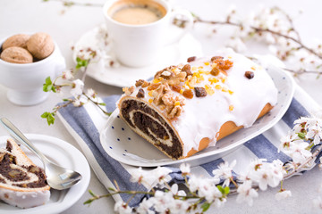 Delicious poppy-seed cake in a spring composition.