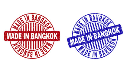 Grunge MADE IN BANGKOK round stamp seals isolated on a white background. Round seals with grunge texture in red and blue colors.