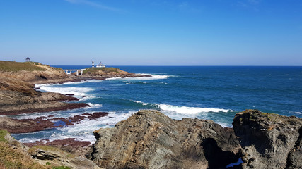 Panoramic view of the coast and lighthouse of Illa Pancha in Ribadeo, Lugo, Galicia - Spain