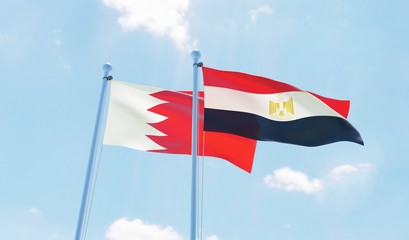 Egypt and Bahrain, two flags waving against blue sky. 3d image