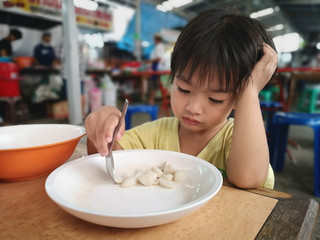 The boys eat the food by himself.