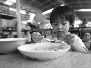 The boys eat the food by himself.