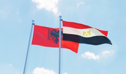 Egypt and Albania, two flags waving against blue sky. 3d image