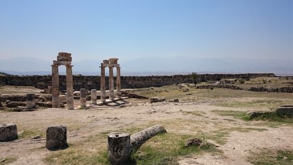 Sunny view of ancient ruins of ancient Hierapolis near Pamukkale, Denizli province, Turkey.