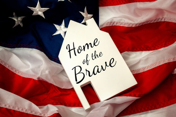 Independence day, land of the free and home of the brave or 4th of July concept theme with a slate...