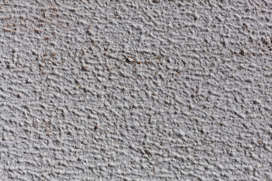 Textura rugosa da tinta de uma parede de cimento. Pode ser usado como plano de fundo.