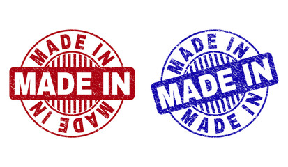 Grunge MADE IN round stamp seals isolated on a white background. Round seals with grunge texture in red and blue colors. Vector rubber watermark of MADE IN title inside circle form with stripes.