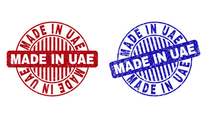 Grunge MADE IN UAE round stamp seals isolated on a white background. Round seals with grunge texture in red and blue colors.