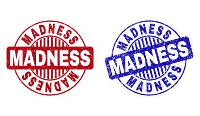 Grunge MADNESS round stamp seals isolated on a white background. Round seals with grunge texture in red and blue colors. Vector rubber watermark of MADNESS tag inside circle form with stripes.