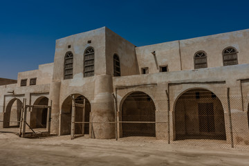 Fototapeta na wymiar A facade and entrance to Aqeer Castle, Saudi Arabia
