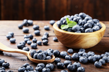 blueberries on wooden background