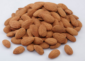 group of almonds isolated on white