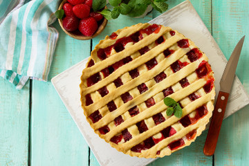 Berry pie summer. Sweet pie, tart with fresh berry strawberries. Delicious cake with strawberries. Top view flat lay background.