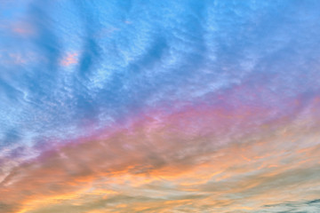 Beautiful sunset sky above clouds with dramatic light