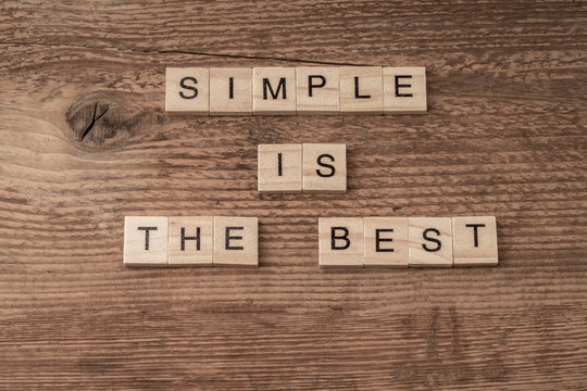 Naklejki Simple is the best slogan written with cube letters