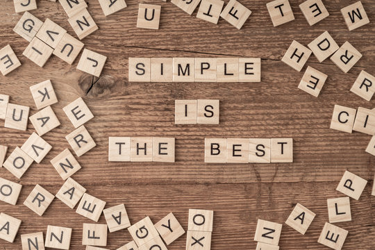 Naklejki Simple is the best slogan written with cube letters