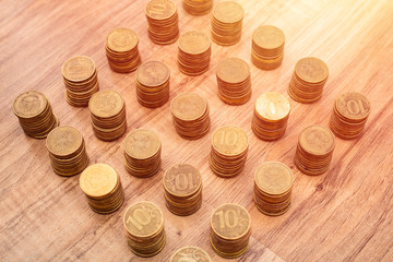 Russian iron money background 10 rubles on wooden background. view top