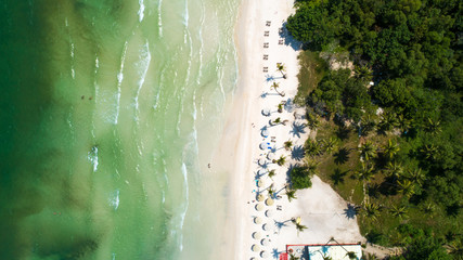 Fototapeta na wymiar Beautiful aerial view for the beach with white sand and crystal clear water in Phu Quoc island in Sao beach
