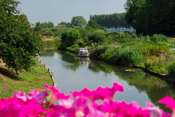 boat in water, gardens, fortified city Buren, The Netherlands