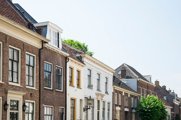 Fototapeta na wymiar houses in street Rodeheldenstraat in Buren, The Netherlands,