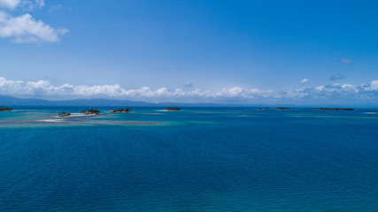 Fototapeta na wymiar Aerial View to San Blas island of Panama. The San Blas islands of Panama is an archipelago comprising 365 island and cays of which 49 inhabited.