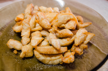 fried meat in a bowl