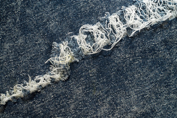 Close up of  blue denim jeans fabric texture background.