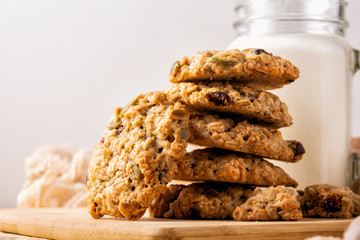 cookies and milk on wooden table