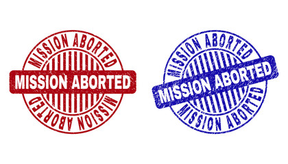 Grunge MISSION ABORTED round stamp seals isolated on a white background. Round seals with grunge texture in red and blue colors.