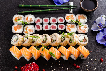 Rainbow Sushi Roll with salmon, eel, tuna, avocado, royal prawn, cream cheese Philadelphia