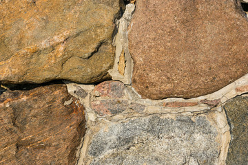 Obraz premium old rough stone wall background
