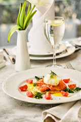 Poached Egg with Salmon and Fresh Cherry Tomatoes.