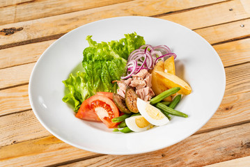 tuna salad on the wooden background