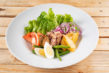 tuna salad on the wooden background